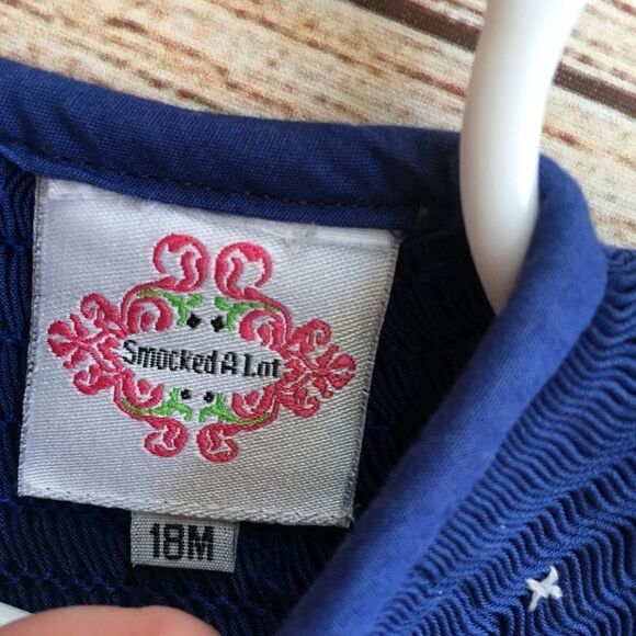 SMOCKED A LOT SMOCKED DRESS‎ WITH EMBROIDERED NATIVITY SCENE - Picture 3 of 7